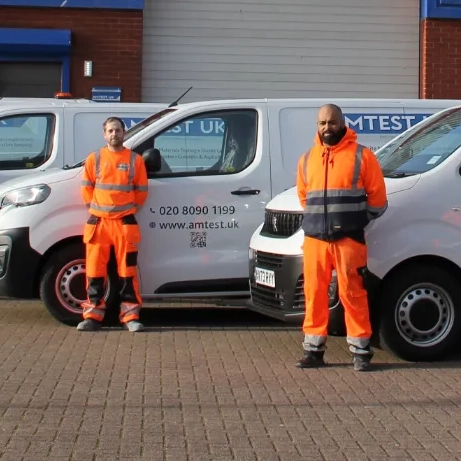 Two technicians from Amtest UK